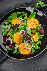tangerine salad citrus, beets, green leaf lettuce, onion fresh delicious healthy eating meal food snack on the table copy space food