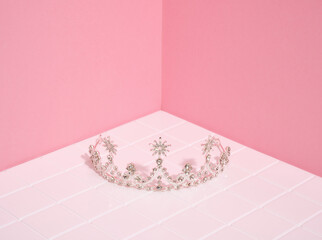 A beautiful expensive tiara with sparkling stones. Copy space for text. Jewelry and a fashionable look. © Dima