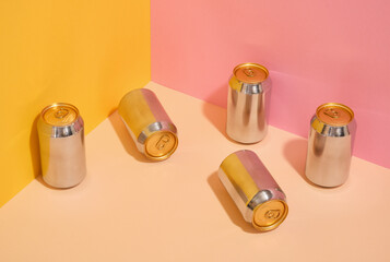 Aluminum cans with various drinks on the table. Party or vacation with friends.
