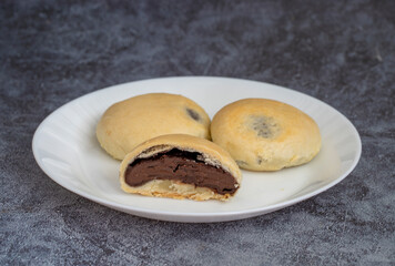 Bomb famous chocolate of Izmir. Chocolate inside thin baked dough. Turkish name is bomba. Izmir famous chocolate concept photo.