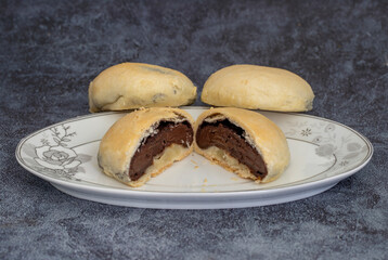 Bomb famous chocolate of Izmir. Chocolate inside thin baked dough. Turkish name is bomba. Izmir famous chocolate concept photo.