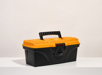 Plastic tool box with construction tools. DIY tools set.