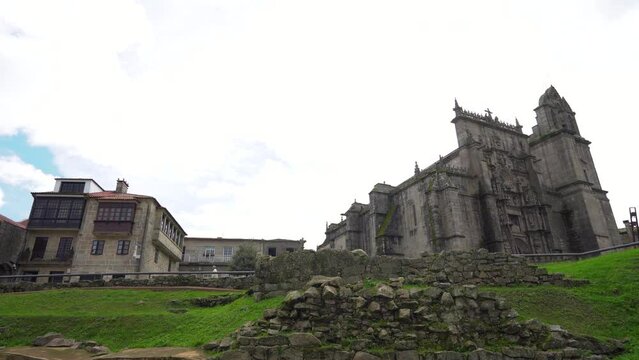 View of Cathedral of Pontevedra, Basilica of Saint Mary Major and  Muralla de Pontevedra. Catholic church dating from the 16th century. Stabilized static footage.