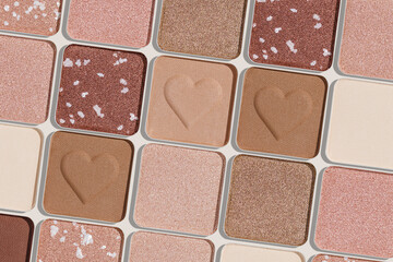 Trend pattern with refill eye shadow swatches, beige brown natural colors on light background. Eyeshadows powder for make up, shiny and matte, minimal aesthetic photo, pastel color, view, flat lay