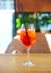 Cocktail glass on wooden table