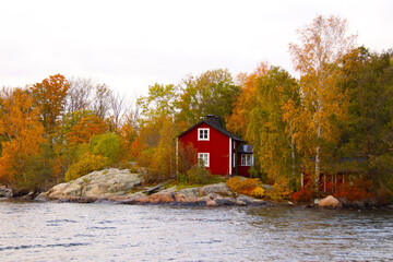swedish houses next to the water