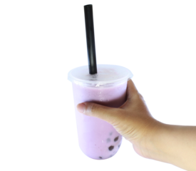 hand holding a cup of boba