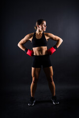 Fototapeta na wymiar Young woman athletic female MMA fighter training. Concept of sport, action, healthy lifestyle.