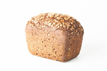 Grain black bread with sunflower seeds. A healthy breakfast.