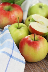 Red and green apples with leaves