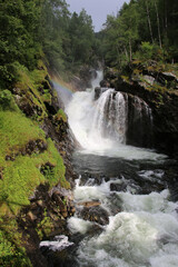 Naklejka na ściany i meble waterfall in the mountains in Otta 
