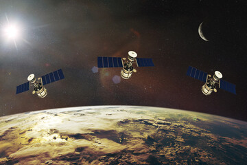 Satellites on low-Earth orbit. Elements of this image furnished by NASA.