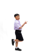 finger point up and side. Thai school uniform with backpack bag. Portrait Young Asian cute boy standing on white studio background banner. Back to school.
