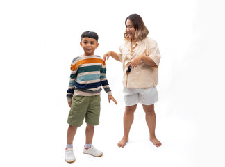 Portrait asian thai mother and son smile and happy standing on white backgrounds banner. Fat and...