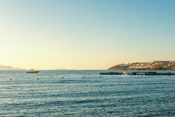 Obraz premium Beautiful view of Red sea surface. Natural background with sunny day sky.