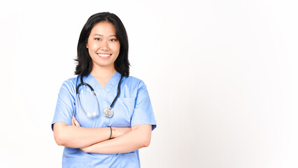 Young Asian female doctor folding arms smiling and looking at camera isolated on white background