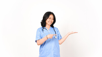 Young Asian female doctor pointing copy space on palm hand isolated on white background