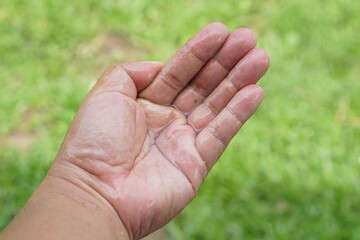 water drops in human hand