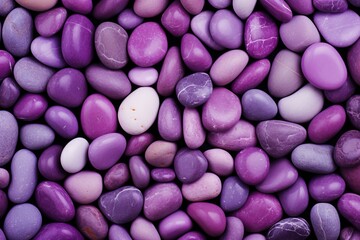 Obraz na płótnie Canvas violet or purple stones background, beach stones 