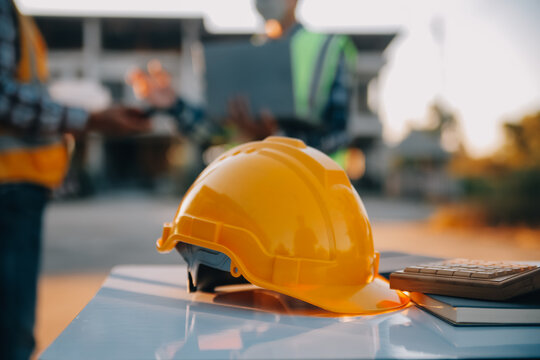 Team Construction or engineering group and worker. Teamwork and determination to succeed. Safety hard hat to prevent accident while working Transport and Container Team. Concept Restart and new Normal