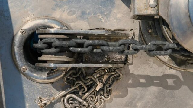 marine windlass on ship vessel working, chain movement, nautical maintenance, drop anchor process