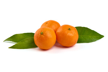 Ripe tangerines with leaves, isolated on a white background.