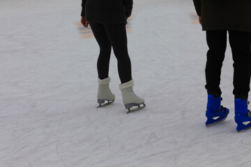 ice skates of the athlete on the ice rink while skating
