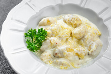 gnocchi cheese sauce potato dough fresh healthy eating cooking appetizer meal food snack on the table copy space food background rustic top view