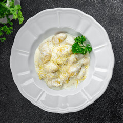 gnocchi cheese sauce potato dough fresh healthy eating cooking appetizer meal food snack on the table copy space food background rustic top view