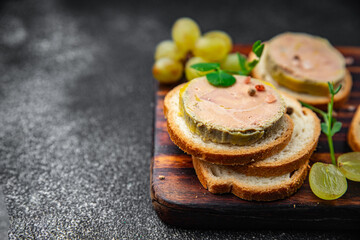 foie gras sandwich fresh goose or duck liver eating cooking appetizer meal food snack on the table...