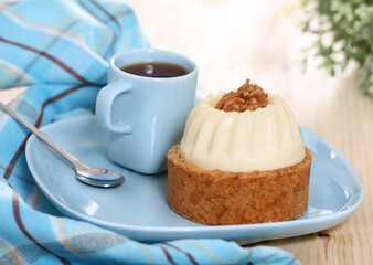 Walnut cake decorated with a cream