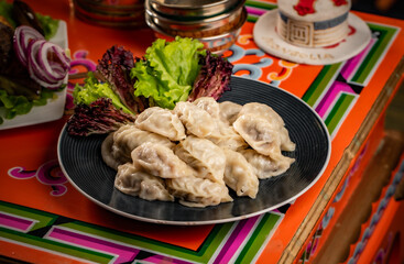 Tsagaan Sar table with Mongolian food, mongolian national food, mongolian traditional food buuz...