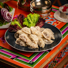 Tsagaan Sar table with Mongolian food, mongolian national food, mongolian traditional food buuz asian lunar year food, Mongolian table 