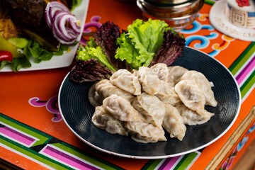 Tsagaan Sar table with Mongolian food, mongolian national food, mongolian traditional food buuz asian lunar year food, Mongolian table 