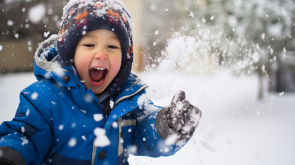 A young child attempting to catch falling snow in their mouth.