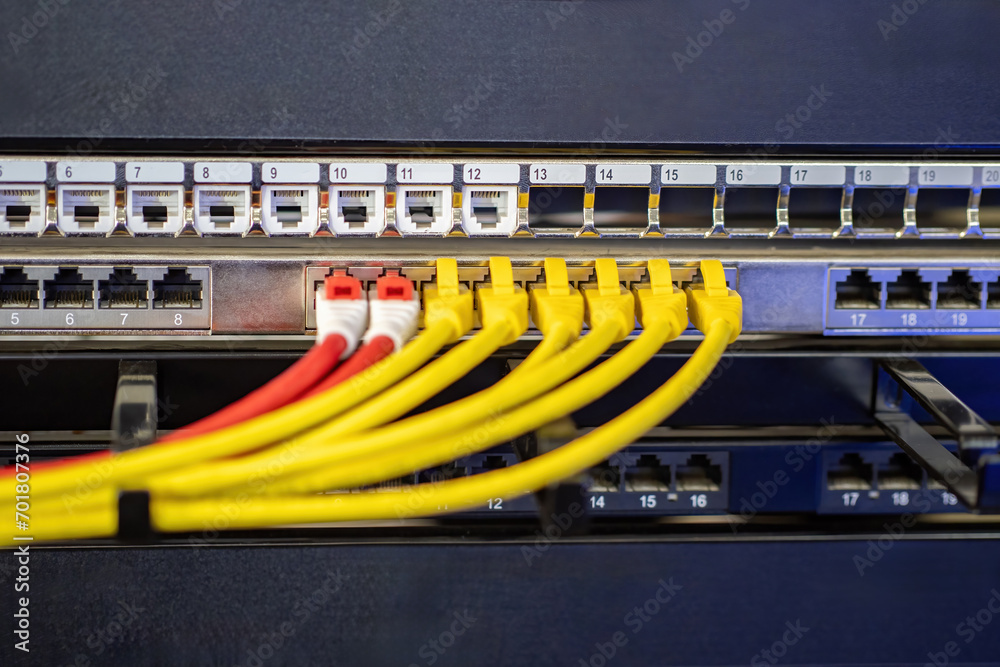 Poster network switch with wires. internet equipment. yellow cables are connected to router. server equipme