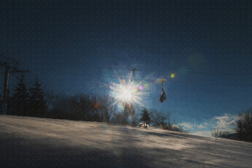 Riding to on the ski lift to the top artistic