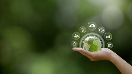 ESG environment social governance investment business concept. Hand of human holding Crystal globe ball with environment icons. Business Strategy and Sustainable Development. green investment. - obrazy, fototapety, plakaty