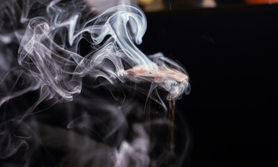 Wooden smoking Incense stick burner at home