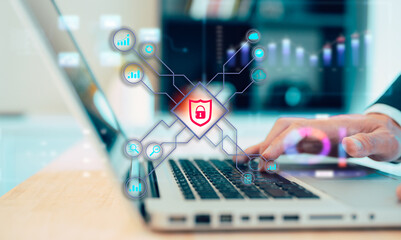 Cybersecurity and privacy concept. Lock icon and internet network security technology. Businessman using laptop and network security technology icons