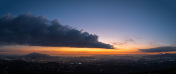 Fototapeta premium Panorama of cloud after sunset over the city