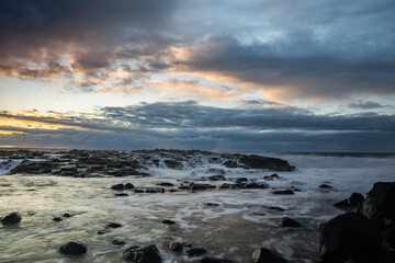 View of Benares beach during sunrise on the south coast of Mauritius island	
