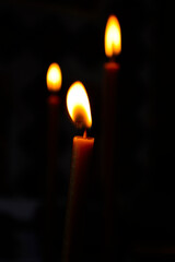 Candle fire on a dark background.