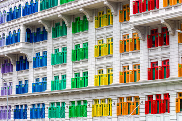 Brightly colored shutters and windows on the landmark Old Hill Street Police Station building in Singapore