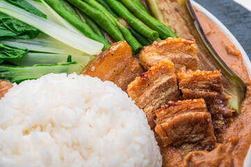 Crispy Pork Kare Kare (Peanut Sauce) with Vegetables and Shrimp Paste on the side 

