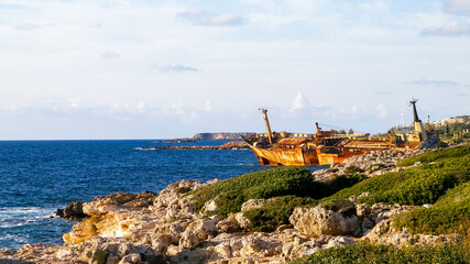 Wreck of Edro III ship on a sea coast. Coral Bay Cyprus. - obrazy, fototapety, plakaty
