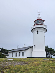Fototapeta na wymiar The beautiful lighthouse at Sletterhage in Denmark