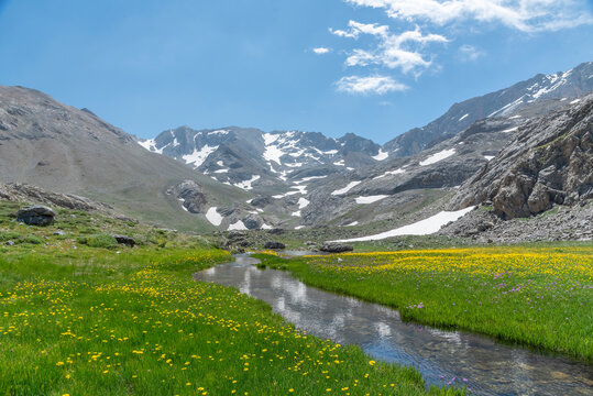 Bolkar mountains from various angles green colored nature flowing water lakes cloudy sky and steep sharp rock forms