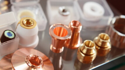 Replaceable details for laser cutting and welding machines - fittings and cones