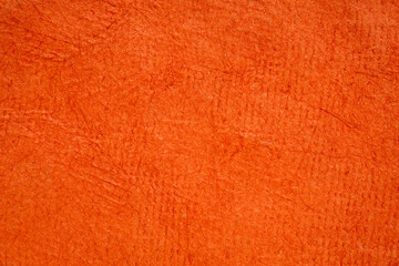 background of orange pumpkin Huun Mayan handmade paper created in Mexico